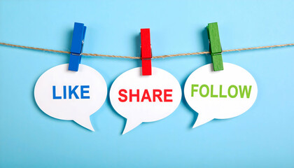 Social media engagement concept: like, share, and follow hanging on a clothesline