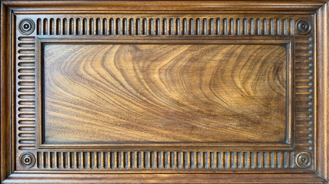 Exquisite Antique Wood Carving: Detailed Panel with Elegant Design and Textured Border. Wood Texture Background with copy-space.