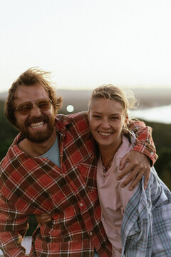 Kissing couple of travellers at the Cape Byron Lighthouse