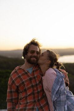 Happy couple of travellers at the Cape Byron Lighthouse
