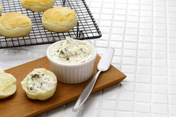 Homemade butter mixed with dulse seaweed and scones.