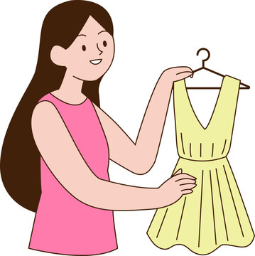 Femme tenant une robe sur un cintre