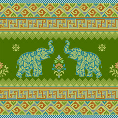 Fototapeta premium Colorful Thai traditional design featuring two symmetrical blue elephants with intricate motifs on a vibrant green background. The surrounding pattern uses pixel-style tribal borders and vibrant tones