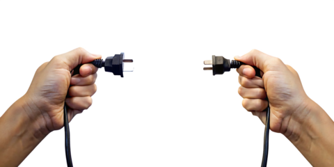 Two hands holding electrical plugs isolated on a white background