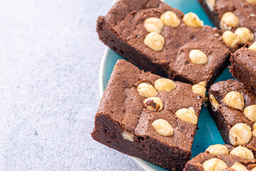 Homemade chocolate brownie photography . Top view on rustic background.Rich chocolate brownie , showcasing its dense texture and glossy surface, professional food photography.