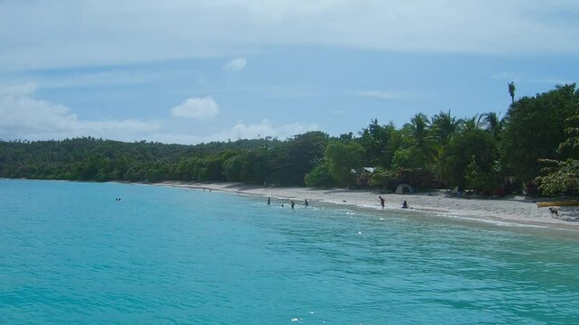 kids playing at subic beach calintaan island matnog philippines