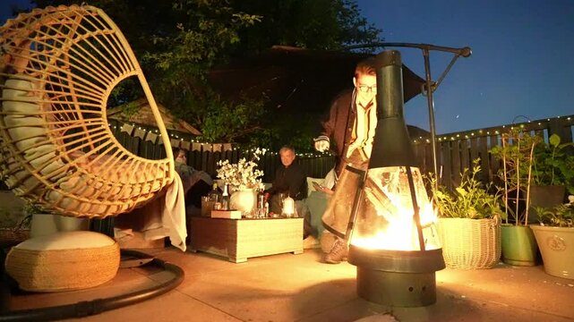 Garden furniture, friendship family nighttime scene, warming firepit