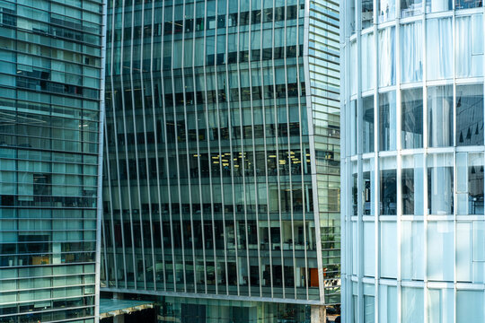 Cluster of modern office buildings with glass facades, reflections, Polanco, Ciudad de M&eacute;xico, geometric lines, urban skyline, natural light