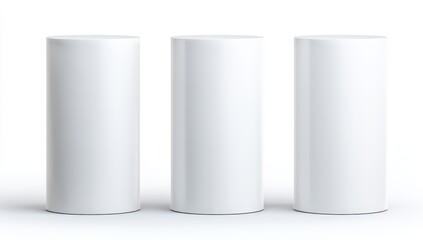 Three blank white cylindrical pedestals (4)