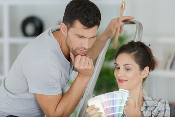 Fototapeta premium young family planning home refurbishing