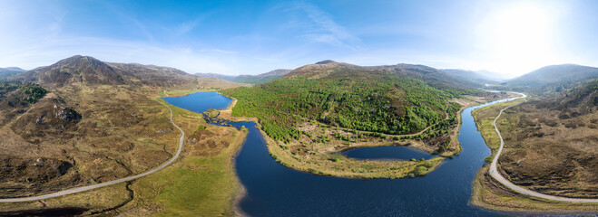 aerial view of Loch Carrie, Loch Sealbhanach and Loch Mullardoc, a water reservoir with hydro electric power station in  a side Valley of Glen Affric ind the highlands of northern Scotland, UK