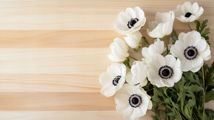 White anemone and daisy flowers arranged on natural wooden backgrounds, perfect for spring, greeting cards, and rustic-themed designs.

