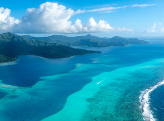 Aerial view of Tahaa island, French Polynesia, with turquoise lagoon and reef © daboost