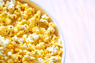 popcorn with cheese before watching a movie at the cinema. from above Family day out