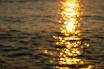 blurred bokeh effect abstract image capturing the golden reflections © pandaclub23