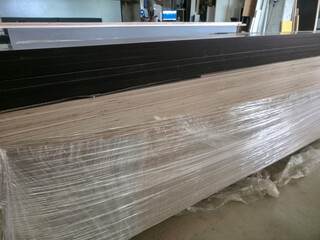 Construction materials prepared for distribution at a warehouse in the afternoon