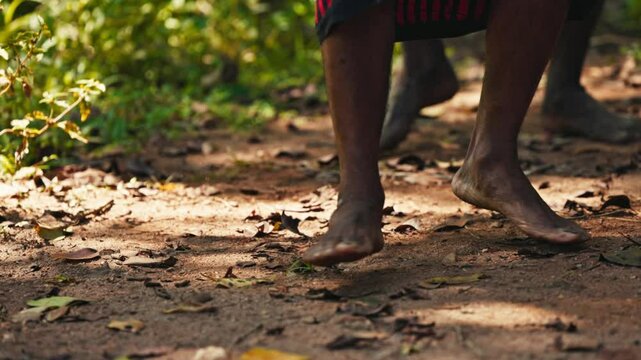 Vedda tribesman of Sri Lanka dancing a ritual dance before hunting, traditional lifestyle, and connection to nature. Tribal portrait in native Habitat 120 fps slow motion. 02.03.2022 SRI LANKA