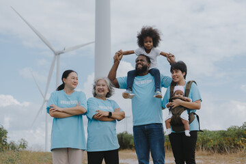 A family of different ages joins in an activity to love nature and the environment on World Day at a wind farm.