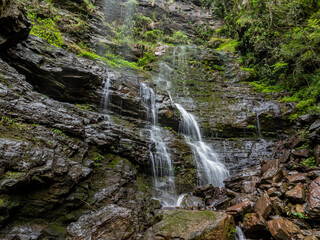 Obraz premium Waterfall in the mountain stream