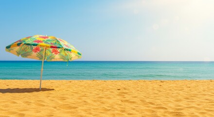 Fototapeta premium Beach umbrella sand and sea summer scene