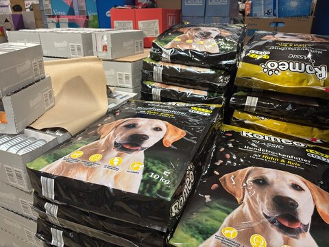 Kitsse, Austria - 25 May 2025: stacked dog food bags Romeo in a hoffer supermarket in Kitsse, Austria, representing pet supply and retail. Concept of pet food brands, of grocery stores.