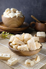 Traditional crispy tofu sticks, a wholesome Asian snack served in rustic bowls. Perfect for promoting authentic, natural, and healthy culinary products or food projects