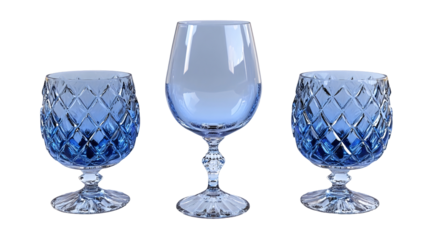 Three blue glass goblets, varying in size and shape, are displayed against a black background.  They feature a diamond-patterned design isolated on transparent or white background. Generative ai