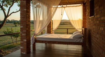 Serene outdoor bedroom with sheer curtains, overlooking a tranquil field at sunset, perfect for relaxation and leisure - bricks bed frame