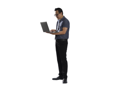 Asian office worker standing and typing on laptop with transparent background