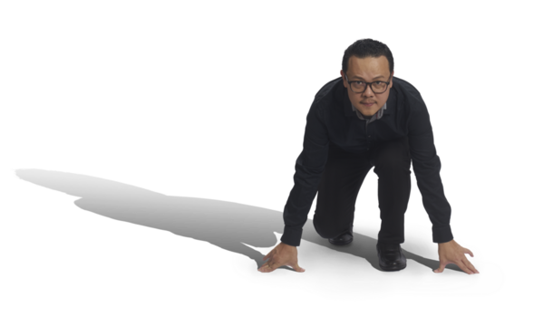 Asian businessman ready to start running on transparent background