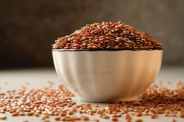 Harvested organic brown rice in a rustic bowl ready for cooking