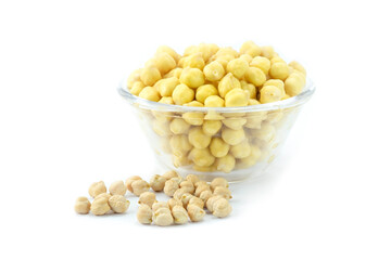 Cooked chickpeas in glass cup and dried outside isolated on white background close up stack