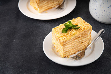 Homemade Napoleon cake slices, layered mille-feuille puff pastry
