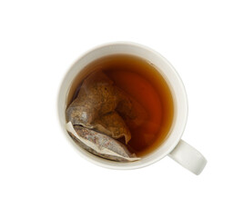 Herbal tea sachet in cup, hot water with chamomile and Hypericum or St. John's wort teabag