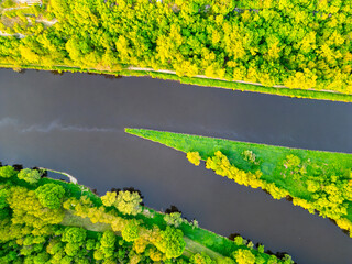 This aerial view showcases the confluence of the Vltava and Labe rivers near Melnik, Czechia,...
