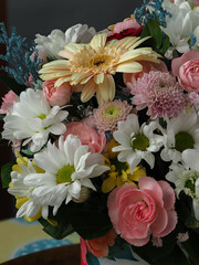 colorful different types of flowers in a bouquet, daisy, carnation, dahlia, rose, gypsophila,...