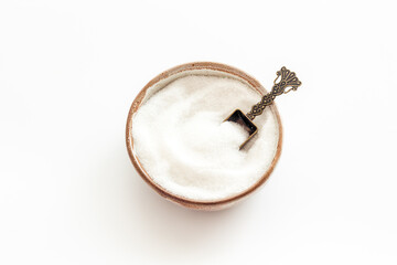 Finely grinding of edible sea salt, close-up. Maintaining acid-base balance concept