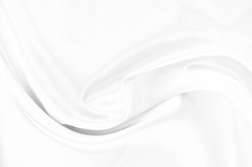 White gray satin texture that is white silver fabric silk background with beautiful soft blur...