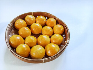 Nastar, Nastar Cookies or Pineapple tarts are small, bite-size tart filled with pineapple jam. Indonesian cookies popular during Eid Mubarak.