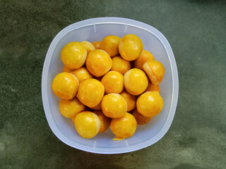 Nastar, Nastar Cookies or Pineapple tarts are small, bite-size tart filled with pineapple jam. Indonesian cookies popular during Eid Mubarak.