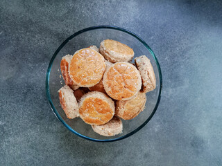 Kue Kacang or Peanut cookies. Homemade cookies for eid mubarak. Indonesian cookies. Served in a bowl. Top view.