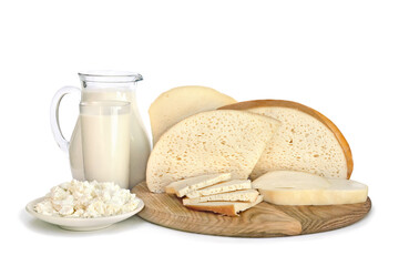 Fresh cheese and milk in a glass and jug on a white background. Minimalist composition of natural dairy products. Healthy, organic food concept