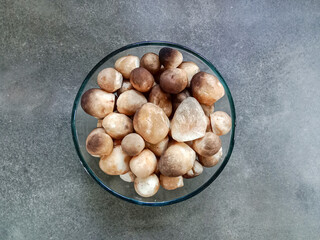 Straw mushroom (Volvariella volvacea). Fresh straw mushrooms. Straw mushrooms for cooking. Food ingredients.