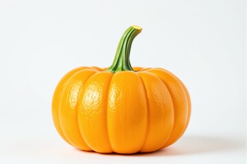 Obraz premium Bright orange pumpkin with a green stem on a light background.