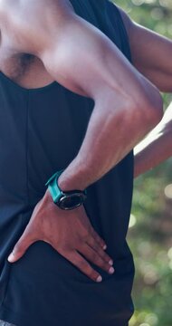 Man, hands or fitness with back pain for sport injury, accident or discomfort at outdoor park. Closeup, male person or runner with sore spine, cramp or ache for muscle tension, sprain or inflammation