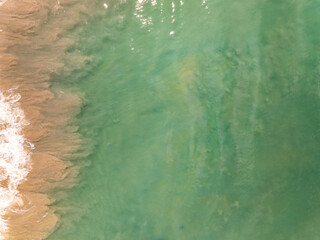 Aerial view landscape sea beach in raining season at Phuket island Thailand.