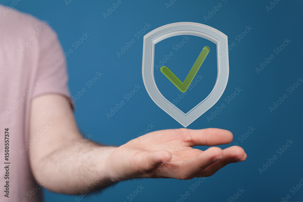 Aufkleber Image of a hand holding a digital shield with a checkmark, symbolizing data protection and security.
