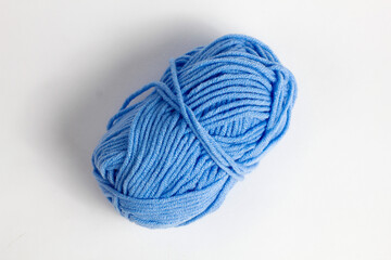 blue wool thread isolated on white background