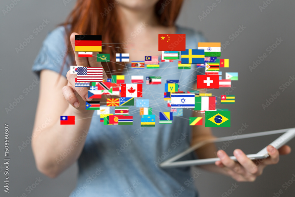Aufkleber a woman uses a tablet to interact with a digital network of world flags, symbolizing global connecti