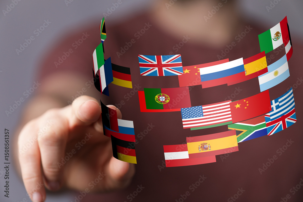 Leinwandbilder hand interacting with a digital display of flags representing global connections and international b